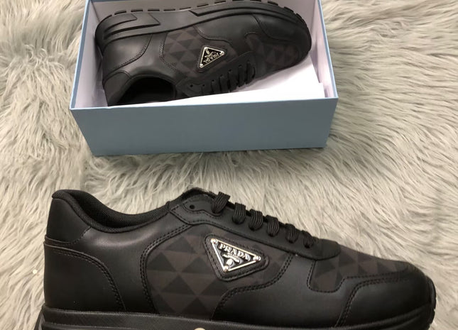 Prada Leather and Re-Nylon High-Top Sneakers
